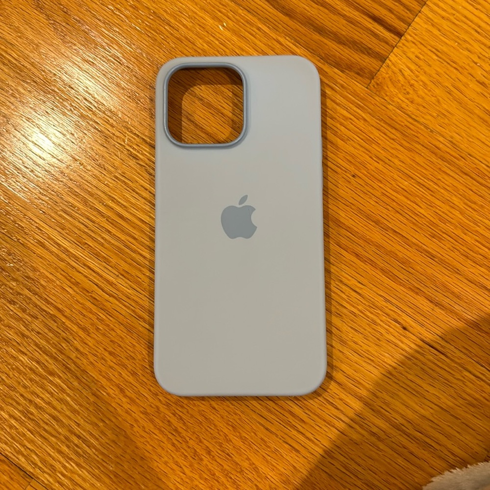 14 pro max Apple phone case in blue, worn